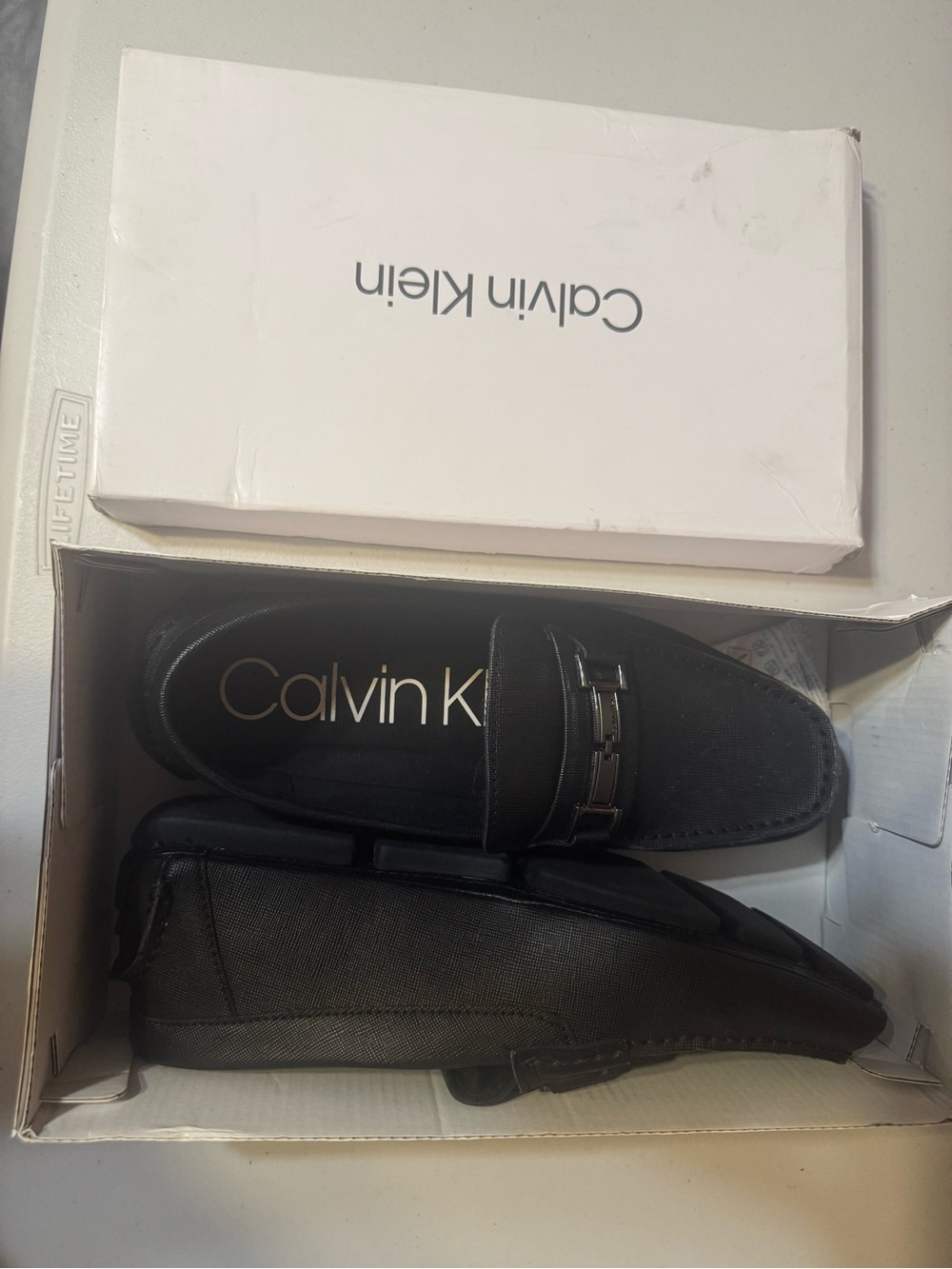 Calvin Klein Black Men’s Slip-On Loafers with Metal Bit